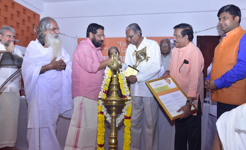 The Vidya Award presented to Dr. A. Sukumaran Nair by the Minister
